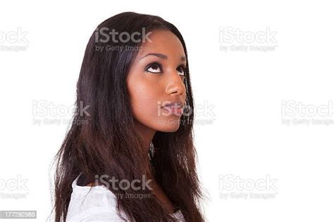 Young Beautiful Black Woman Looking Up Stock Photo Download Image Now