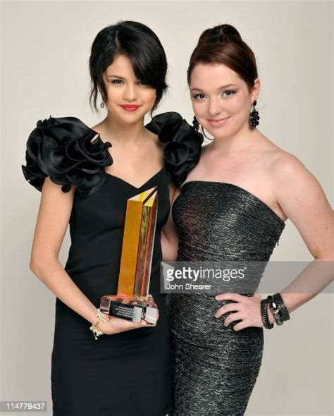 Actress Selena Gomez And Actress Jennifer Stone Pose For A Portrait