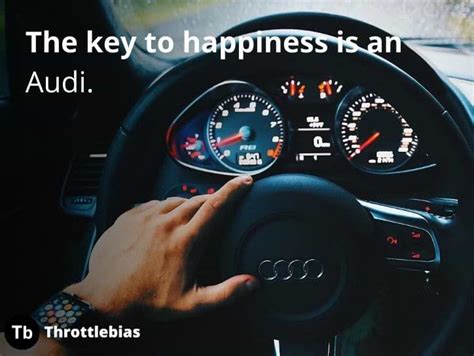 A Person Driving A Car With The Words The Key To Happiness Is An Audi