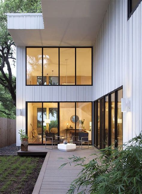 A Budget Conscious Modern Home Rises Above The Trees In Central Austin