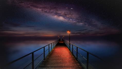 Ocean Pier Under Milky Way Sky Wallpaper Hd Nature 4k