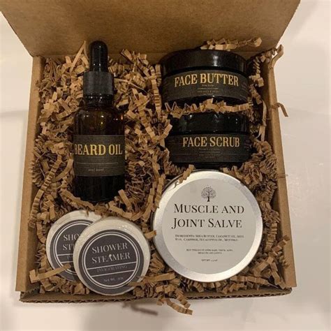 An Open Box Containing Facial Care Products Including Beard Butter And