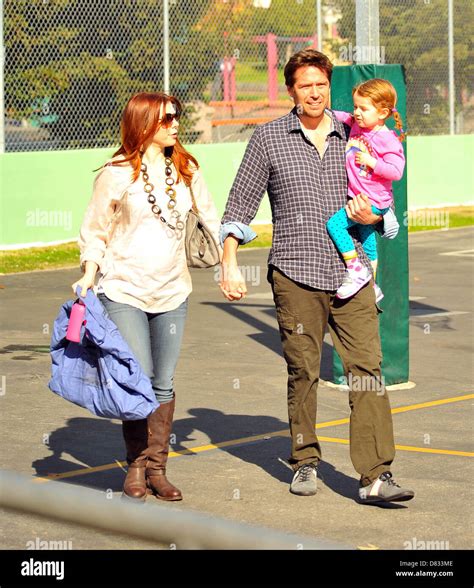 pregnant alyson hannigan and husband alexis denisof and daughter satanya denisof at a farmers