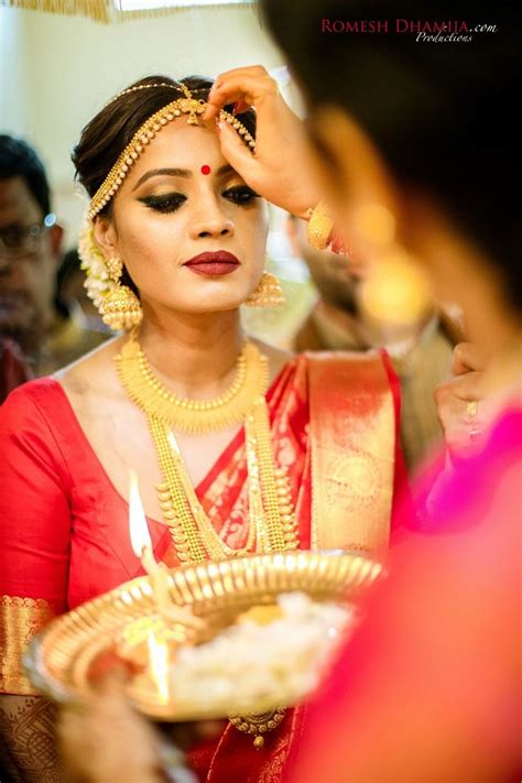 red and gold classic south indian wedding {mumbai india} wedding saree indian south indian