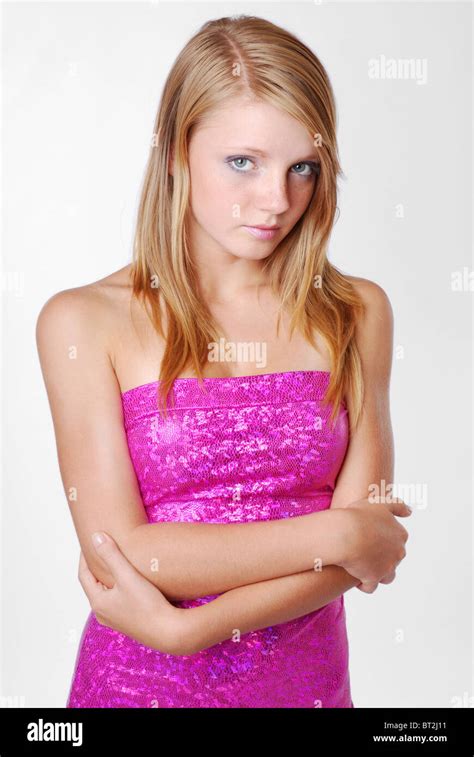 Pensive Teenage Girl In Pink Dress Stock Photo Alamy
