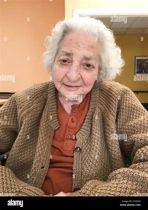 Old Lady Smiling And Looking At The Camera Stock Photo Alamy