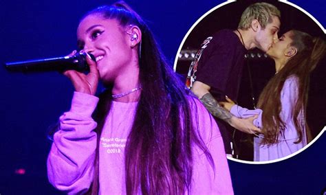 Ariana Grande Shares A Passionate Kiss On Stage With Fiancé Pete