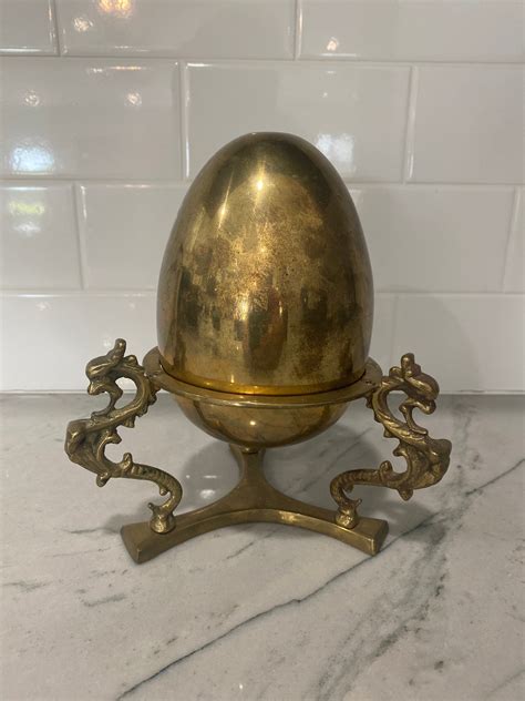 Vintage Brass Display Stand Fleur De Lis Ostrich Egg Stand Orb Paper Weight Display For Office