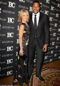Kelly Ripa Is Radiant In A Black Satin Printed Gown As She Attends