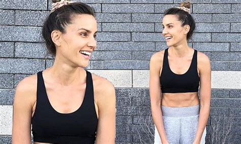 Rachael Finch Showcases Her Ripped Abs In Miniature Crop Top