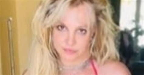 Britney Spears Strips Off To Red Bikini As She Tugs Down At Bottoms In