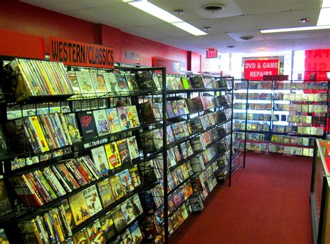 Americans love to shop, browse, and simply spend some time looking at new items up for sale. USA near Philadelphia rare peek inside retro DVD store - v ...