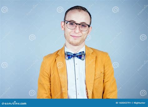 Portrait Of A Young Male Nerd In Glasses And In A Stylish Suit Stock