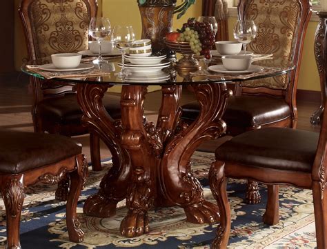 This oval dining room table comes in a grey finish that's a beautiful addition to any home that have a neutral foundation. Dresden Formal Carved Wood 54" Round Glass Top Dining ...