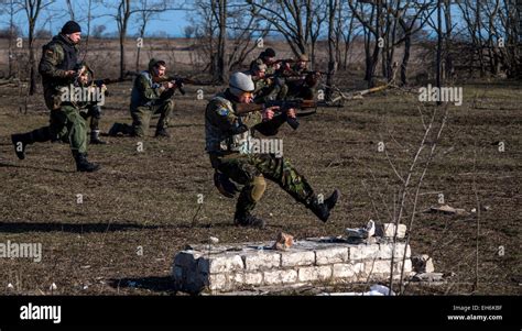 Berdyansk Oblast, Ukraine - March, 7: Men from Azov Battalion run Stock Photo: 79437555 - Alamy
