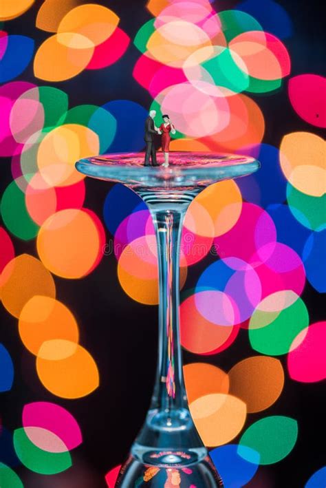Minature Figures Ballroom Dancing On Wine Glasses Stock Image Image