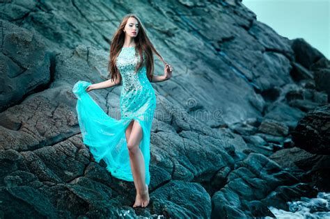 Woman Posing On A Beach With Rocks Stock Image Image Of Hair Beauty 63303177