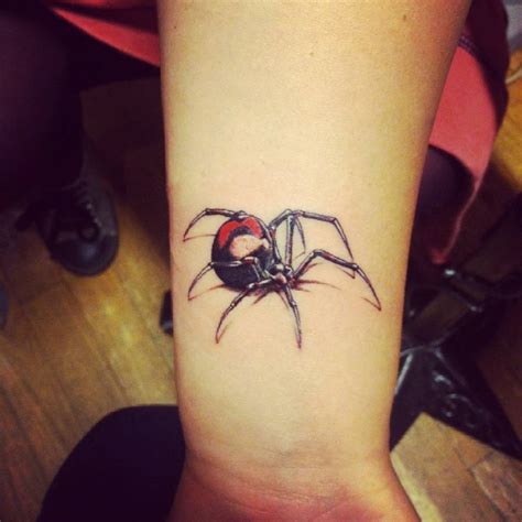 Forearm Tattoo Of A Black Widow Spider By Jay Shin
