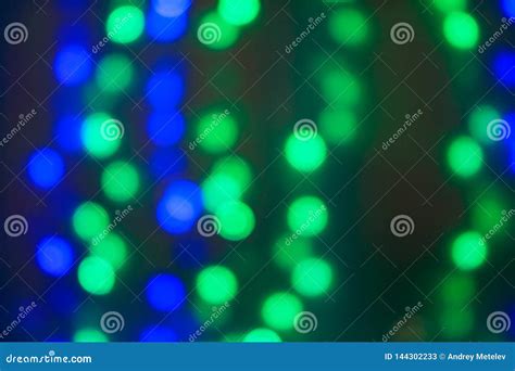 Blurred Abstract Background Of Colored Blue And Green Lights Stock
