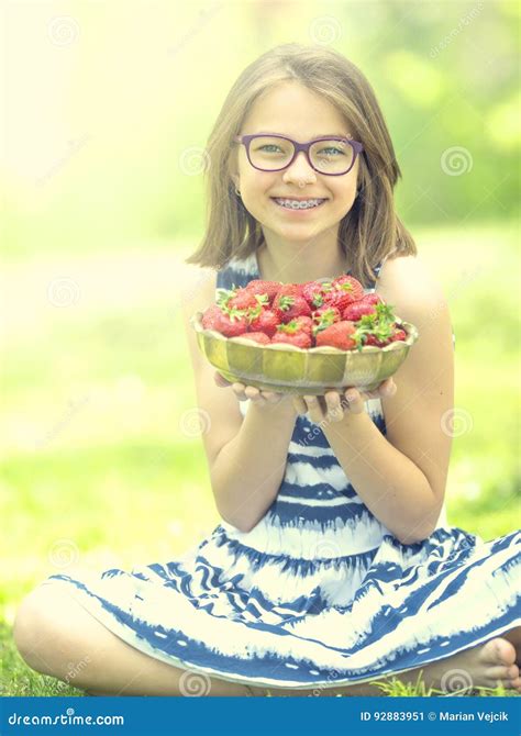 Cute Little Girl With Bowl Full Of Fresh Strawberries Pre Teen Girl