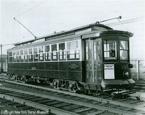 Trolley Streetcar That Ran On Tracks And Was Operated By Overhead Or