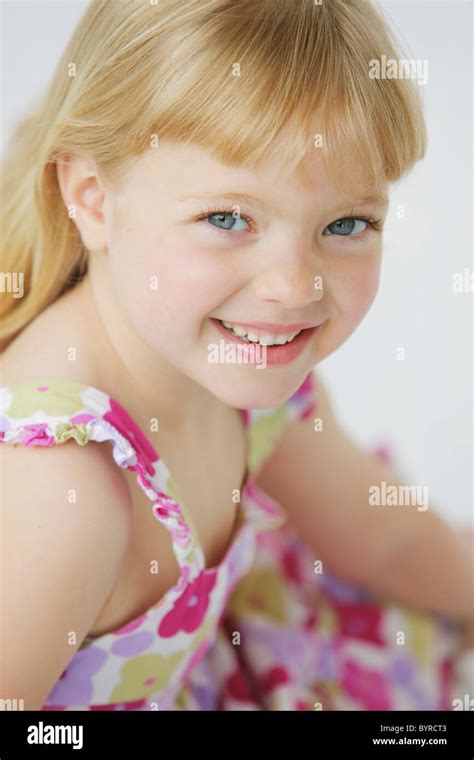 Portrait Of A Girl With Long Blond Hair And Blue Eyes Troutdale