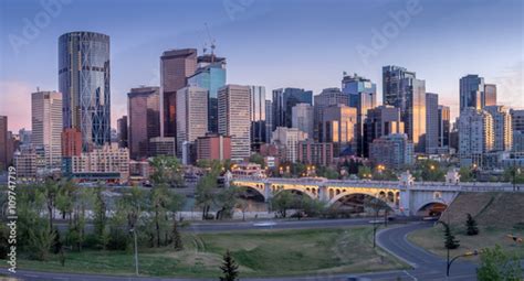 Calgary Skyline At Night With Bow River And Centre Street Bridge