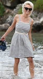 Pamela Anderson Splashes Around On Beach In Stripy Sundress And Shades