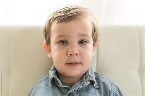 A 2 Year Old Little Boy Looks Right At The Camera By Stocksy