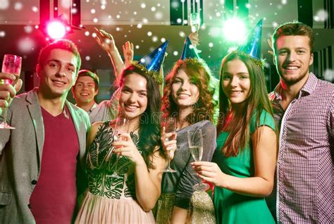 Smiling Friends With Glasses Of Champagne In Club Stock Image Image