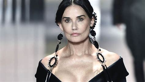 The 'striptease' star took to instagram to share a video of her carrying a handful of books wearing a casually chic outfit. Demi Moore stuns catwalk at 58 - WYZA