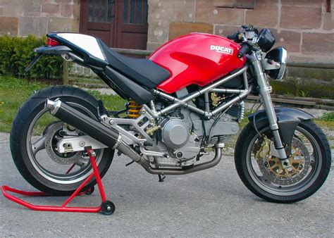 Photography by courtesy of ducati north america. Ducati Monster 600/620/695/750/800/900/1000/S4 slip-on LOW ...