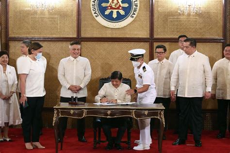 Marcos Signs Sim Registration Law Abs Cbn News