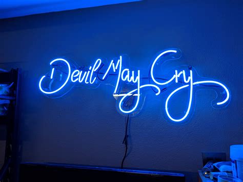 Went and got this custom life size Devil May Cry sign made for my Workshop! Went to local Neon 