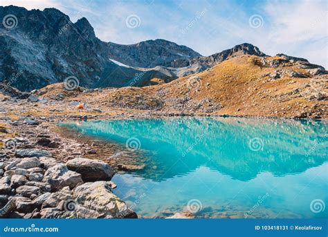 Beautiful Turquoise Alpine Lake Travels In The Mountains Stock Image