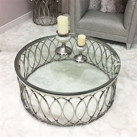 It makes the perfect perch for decorative serving trays or even board games for game nights with friends and family. Primrose Chrome And Glass Coffee Table | Picture Perfect Home
