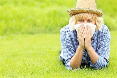 Woman Allergic To Grass — Stock Photo © Macniak 47836085