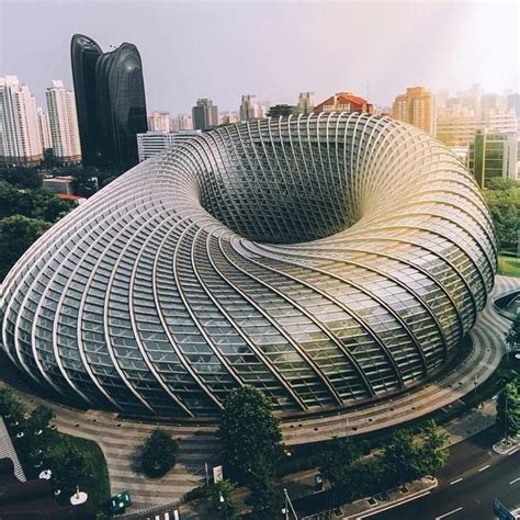 Arch2o On Instagram The Beijing Tv Studio Is Wrapped Up In A Doughnut