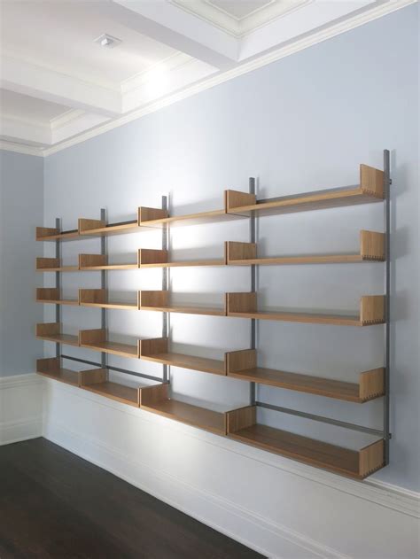 As4 Modular Shelving System In White Oak And Cold Rolled Steel Wall