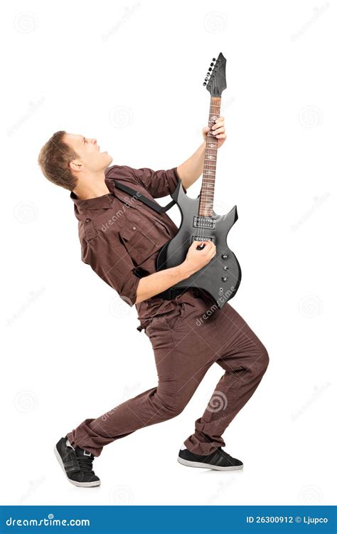 Full Length Portrait Of A Rock Star Playing Guitar Stock Photo Image