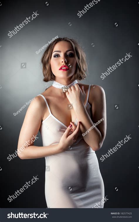 Attractive Sexy Woman Posing White Negligee Stock Photo