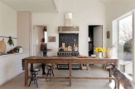 Instead of small utility you could have large laundry cupboard along there which will gain you extra width in room without losing much function? 10 Reasons to Consider a Kitchen Table Instead of an ...