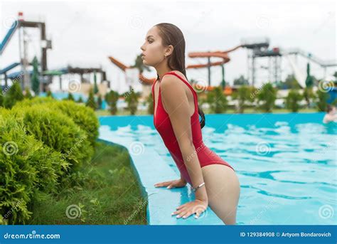 Beautiful Woman With Healthy Tanned Skin In Bikini Relaxing In Swimming