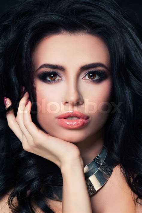 Beautiful Lady With Dark Curly Perfect Brunette With Event Makeup And Permed Hair Stock Image