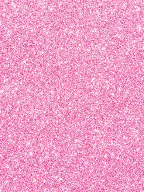 A Pink Background With Small Speckles
