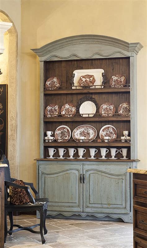 Traditionally, a hutch looks like a china cabinet on top of a sideboard or credenza. 30 Delightful Dining Room Hutches and China Cabinets