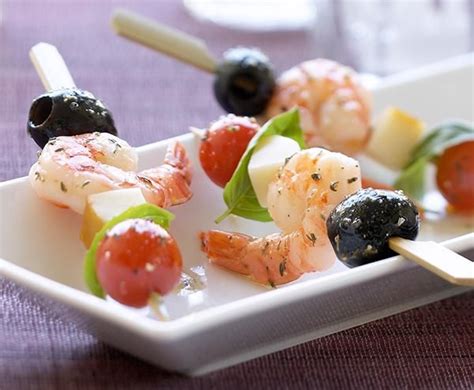 They take no time at all to prepare, so they're great for a weekday meal thread alternating shrimp and scallops on skewers. Tangy Shrimp Appetizer Skewers | Recipe | Skewer ...