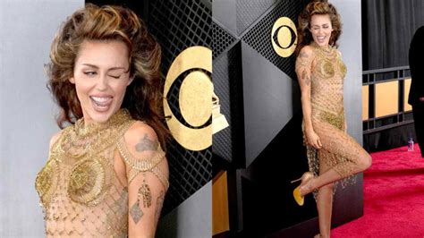 Miley Cyrus Wears A Nude Maison Margiela Dress Made Of Hundreds Of Gold Safety Pins At The 66th