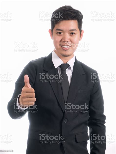 Portrait Of Asian Business Man With Thumb Up On White Background Stock