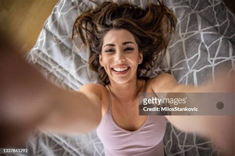 Young Women Taking Selfies In Bed Photos And Premium High Res Pictures Getty Images